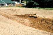 Excavation and filling with dirt continues